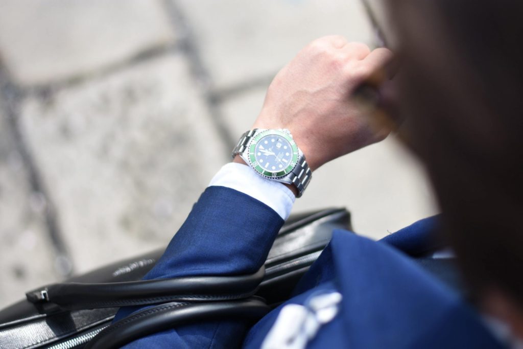 A person wearing a wristwatch